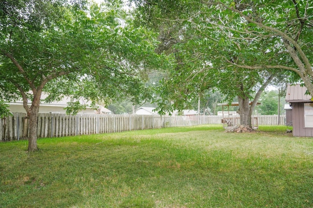 view of yard featuring a fenced backyard