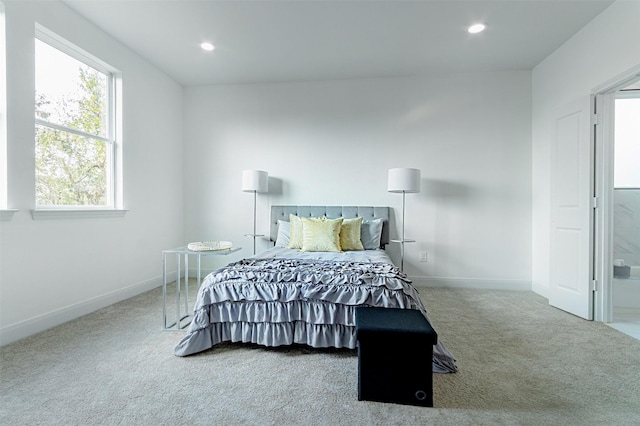 bedroom with recessed lighting, carpet flooring, and baseboards