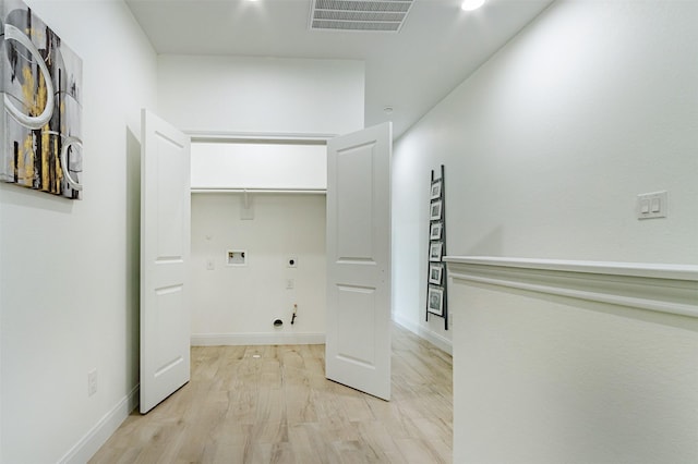 washroom with hookup for a washing machine, hookup for a gas dryer, visible vents, hookup for an electric dryer, and laundry area