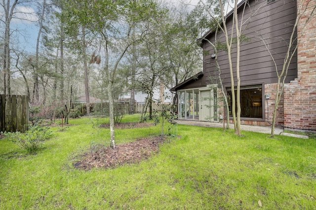 view of yard with fence