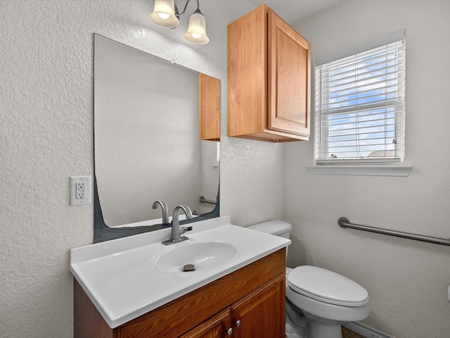 1206 Middle Dr W, Surfside Beach, TX 77541 - half bathroom with vanity and a textured wall