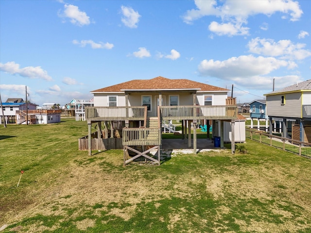 1206 Middle Dr W, Surfside Beach, TX 77541 - back of house featuring a deck, stairway, and roof with shingles