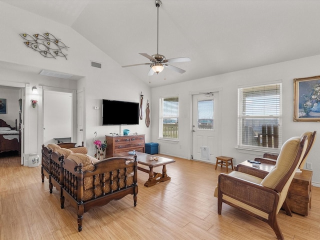 1206 Middle Dr W, Surfside Beach, TX 77541 - living area featuring light wood-style floors, ceiling fan, and high vaulted ceiling