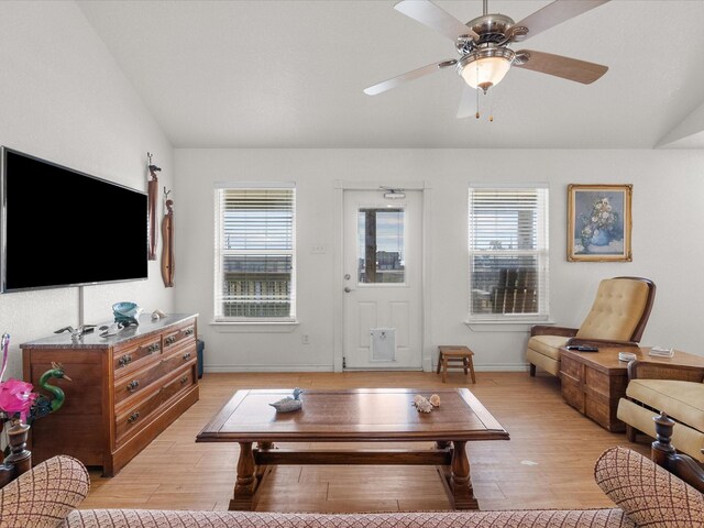 1206 Middle Dr W, Surfside Beach, TX 77541 - living area featuring light wood-style flooring, lofted ceiling, and a ceiling fan
