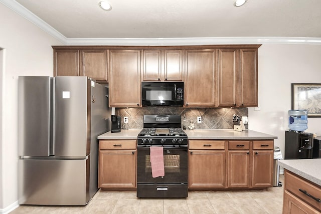 kitchen with black appliances, ornamental molding, brown cabinets, and backsplash