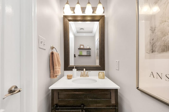 bathroom with visible vents and vanity