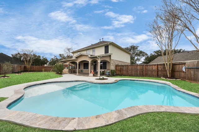 view of swimming pool featuring a fenced backyard, a fenced in pool, a lawn, and a patio