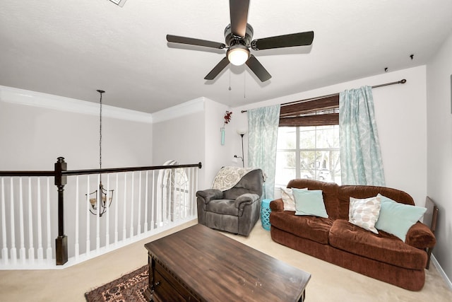 sitting room with light carpet and ornamental molding