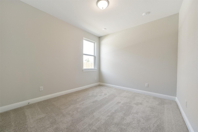 16319 Placid Stream St, Conroe, TX 77302 - spare room featuring light carpet and baseboards