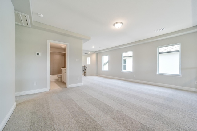 16319 Placid Stream St, Conroe, TX 77302 - unfurnished bedroom featuring baseboards, light colored carpet, recessed lighting, and ensuite bath