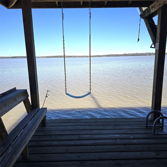 dock area featuring a water view