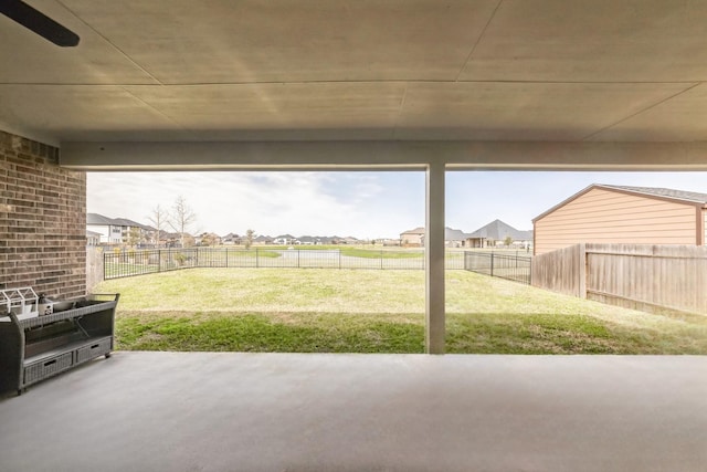 view of patio / terrace with a residential view and a fenced backyard