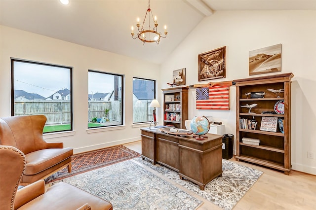 office featuring light wood-style floors, a notable chandelier, vaulted ceiling with beams, and baseboards