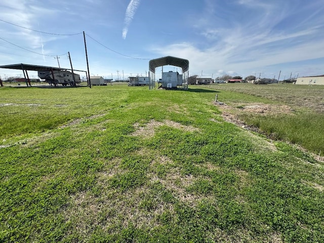 view of yard featuring a detached carport