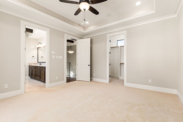 506 Knox St, Houston, TX 77007 - unfurnished bedroom with light colored carpet, a raised ceiling, ornamental molding, a walk in closet, and ensuite bathroom