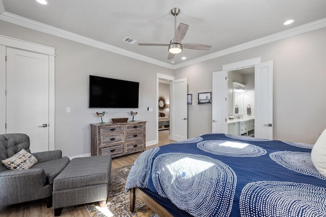 bedroom featuring wood finished floors, visible vents, baseboards, recessed lighting, and ornamental molding