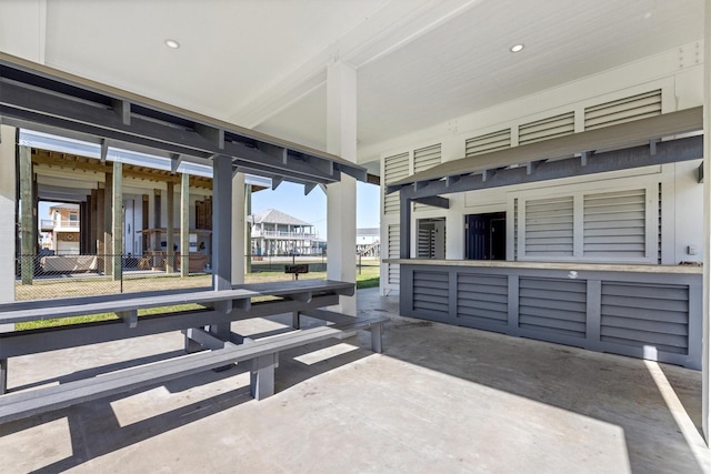 view of patio featuring fence