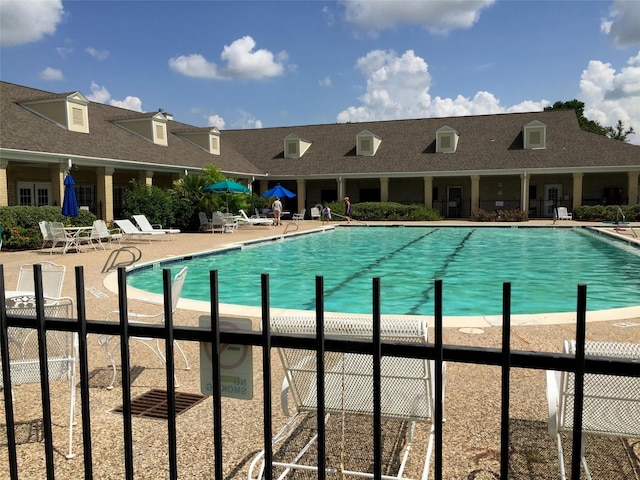community pool featuring a patio