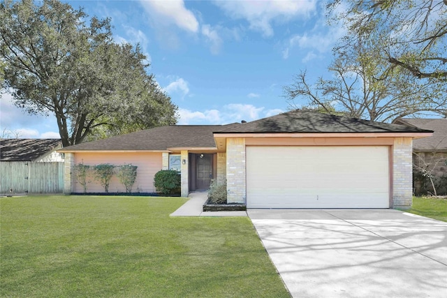 ranch-style house featuring brick siding, concrete driveway, an attached garage, fence, and a front lawn