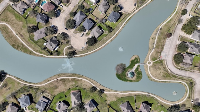 bird's eye view featuring a water view and a residential view