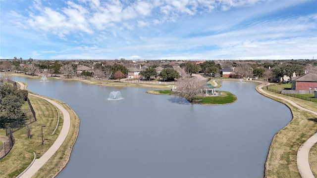 birds eye view of property with a residential view and a water view