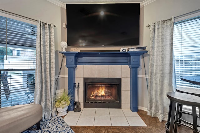 details featuring a fireplace and crown molding