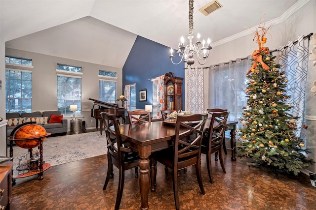 dining room with ornamental molding, lofted ceiling, visible vents, and a notable chandelier