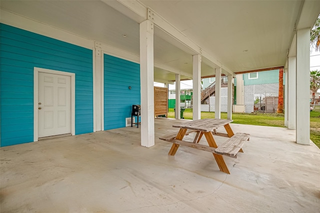 view of patio / terrace with stairway and outdoor dining space