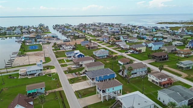 aerial view featuring a residential view and a water view