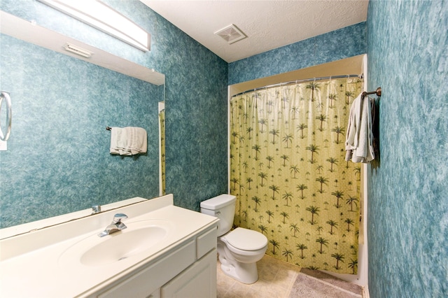 full bathroom featuring toilet, wallpapered walls, visible vents, and vanity