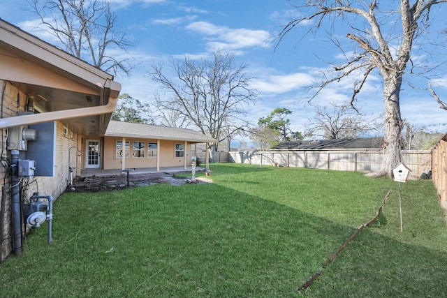 view of yard featuring a fenced backyard