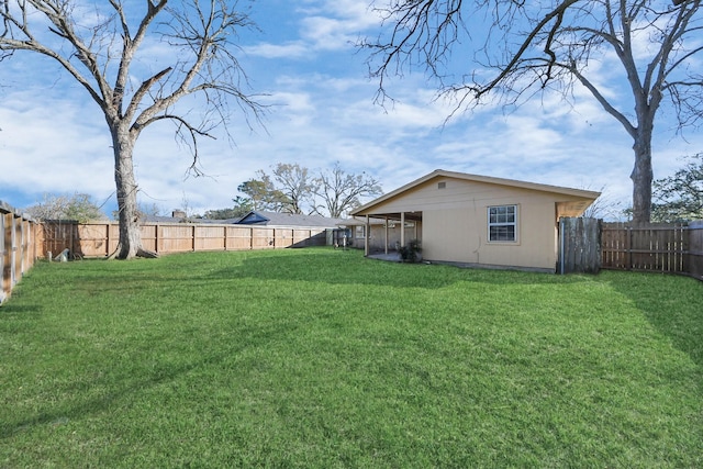 view of yard featuring a fenced backyard