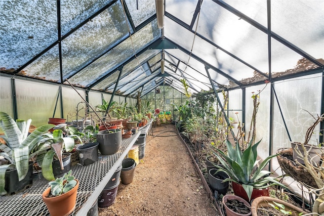 sunroom with vaulted ceiling and a wealth of natural light