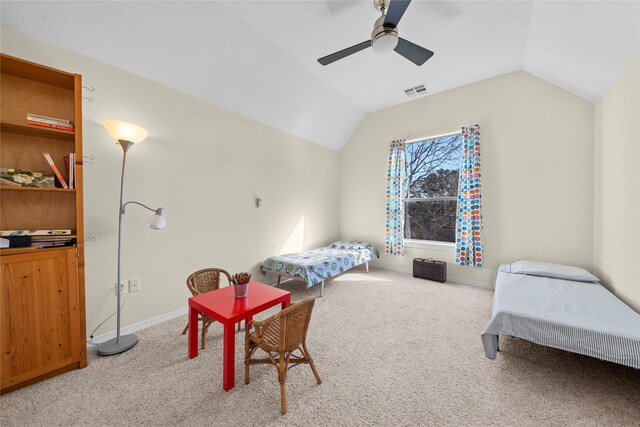 bedroom with a ceiling fan, visible vents, vaulted ceiling, baseboards, and carpet