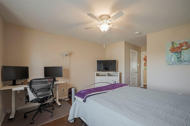 bedroom featuring dark wood-style floors and ceiling fan