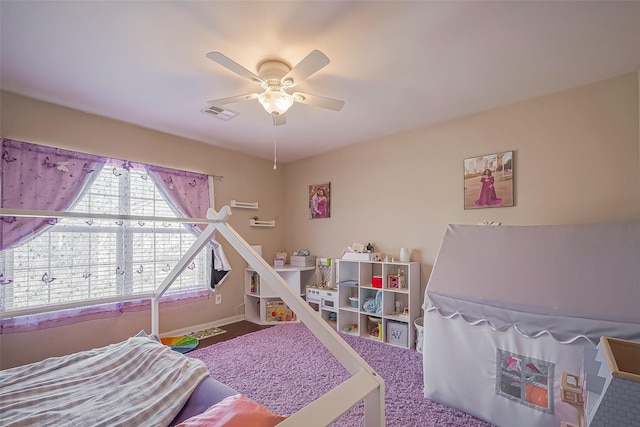 bedroom featuring carpet, ceiling fan, visible vents, and baseboards