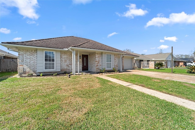 single story home with an attached garage, brick siding, fence, concrete driveway, and a front yard