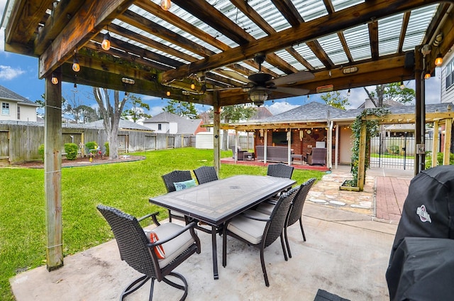 view of patio / terrace with outdoor dining area, a fenced backyard, a ceiling fan, and a pergola