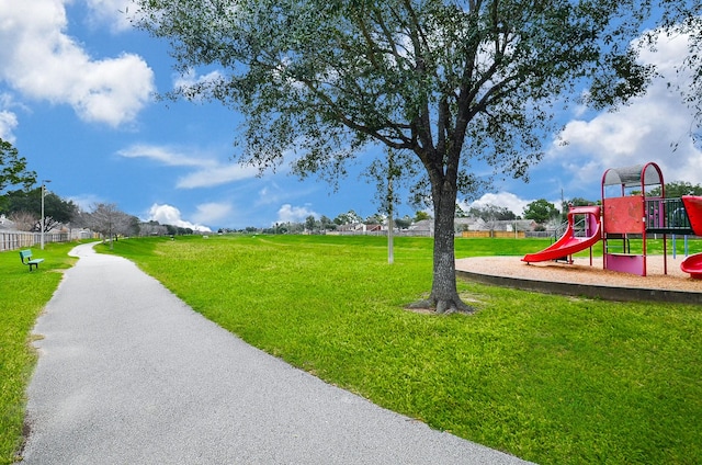 exterior space featuring a yard and fence