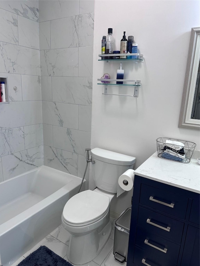 bathroom with toilet, marble finish floor, shower / washtub combination, and vanity