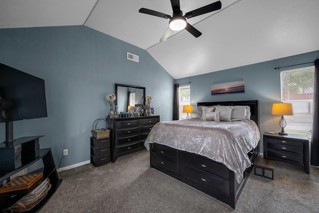 bedroom featuring visible vents, vaulted ceiling, baseboards, and multiple windows