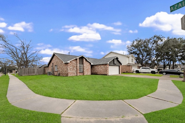 view of property exterior featuring an attached garage, brick siding, fence, a yard, and concrete driveway