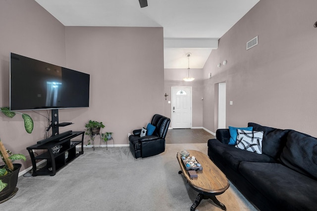 carpeted living room with high vaulted ceiling, visible vents, and baseboards