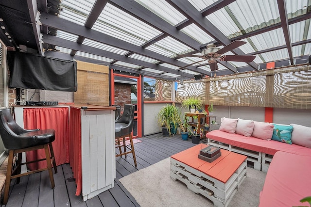 deck with outdoor dry bar, ceiling fan, outdoor lounge area, and a pergola