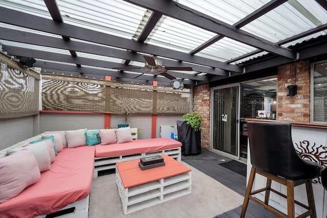 view of patio / terrace featuring an outdoor bar, outdoor lounge area, and a pergola