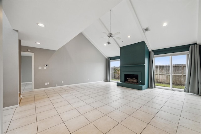 unfurnished living room featuring a large fireplace, baseboards, visible vents, a ceiling fan, and high vaulted ceiling