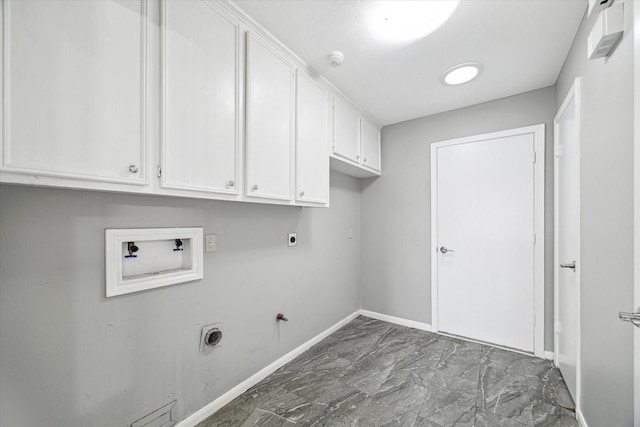 laundry room with hookup for a washing machine, hookup for a gas dryer, cabinet space, hookup for an electric dryer, and baseboards