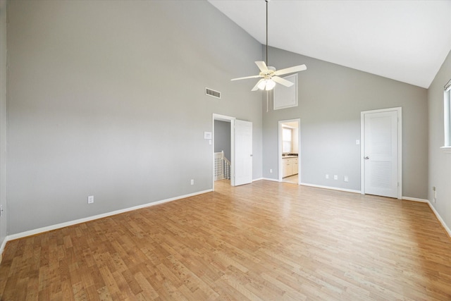 interior space featuring ensuite bathroom, light wood-type flooring, visible vents, and baseboards