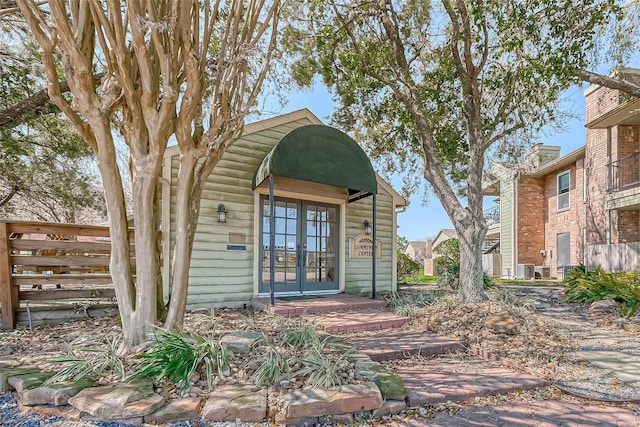 view of exterior entry with french doors