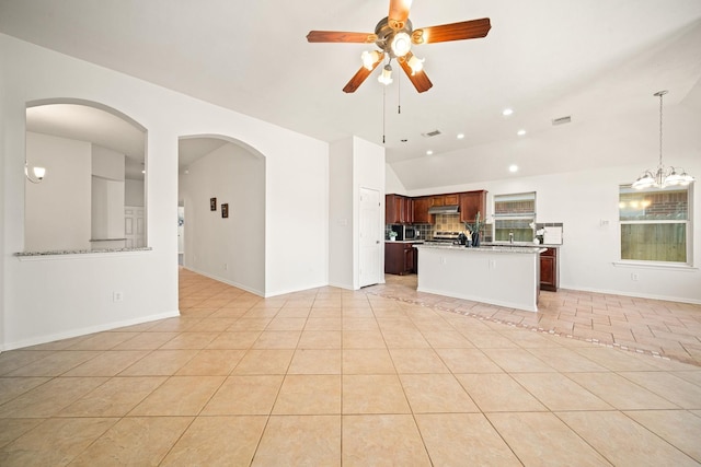 unfurnished living room with light tile patterned flooring, recessed lighting, ceiling fan with notable chandelier, visible vents, and vaulted ceiling